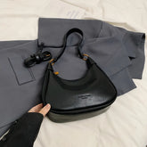 Curved Leather Shoulder Bag Black onesize OutfitFlow