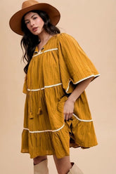 Annie Wear Tassel Contrast Trim Tie Neck Half Sleeve Tiered Dress Mustard OutfitFlow