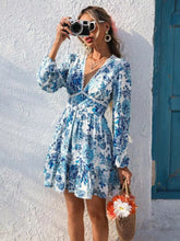 Full Size Floral Print V-Neck Long Sleeve Ruffle Hem Mini Dress Plus Size Blue Trendsi