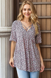 Heimish Full Size Short Sleeve Crisscross Animal Babydoll Top Plus Size Ivory Neon Pink OutfitFlow