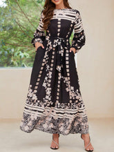 Printed Round Neck Long Sleeve Maxi Dress with Pockets Black OutfitFlow