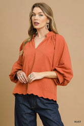 Umgee Textured Notched Balloon Sleeve Blouse with Scalloped Hem Rust OutfitFlow