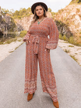 Plus Size Printed V-Neck Tie Front Balloon Sleeve Jumpsuit Floral OutfitFlow