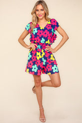 Haptics Floral Smocked Waist Romper with Side Pockets Navy Fuchsia OutfitFlow