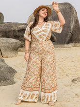 Plus Size V-Neck Flutter Sleeve Wide Leg Jumpsuit Apricot OutfitFlow
