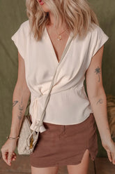 Surplice Knotted Ruched Cap Sleeve Blouse Eggshell OutfitFlow