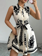 Printed Sleeveless Tie Waist Mini Dress Black OutfitFlow