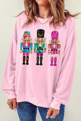 Nutcracker Graphic Round Neck Long Sleeve Sweatshirt Blush Pink OutfitFlow