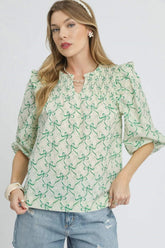 Umgee Ruffled Bow Print Notched Blouse Green OutfitFlow