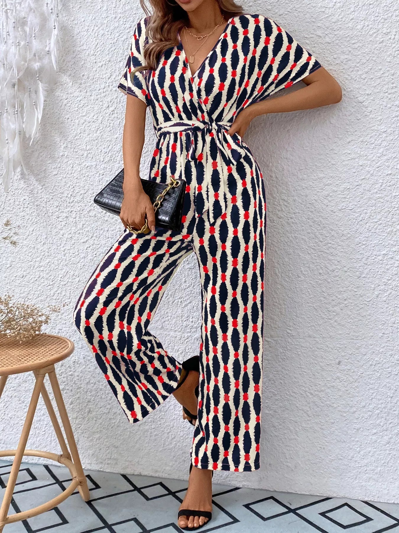 Printed Surplice Tie Waist Short Sleeve Jumpsuit OutfitFlow
