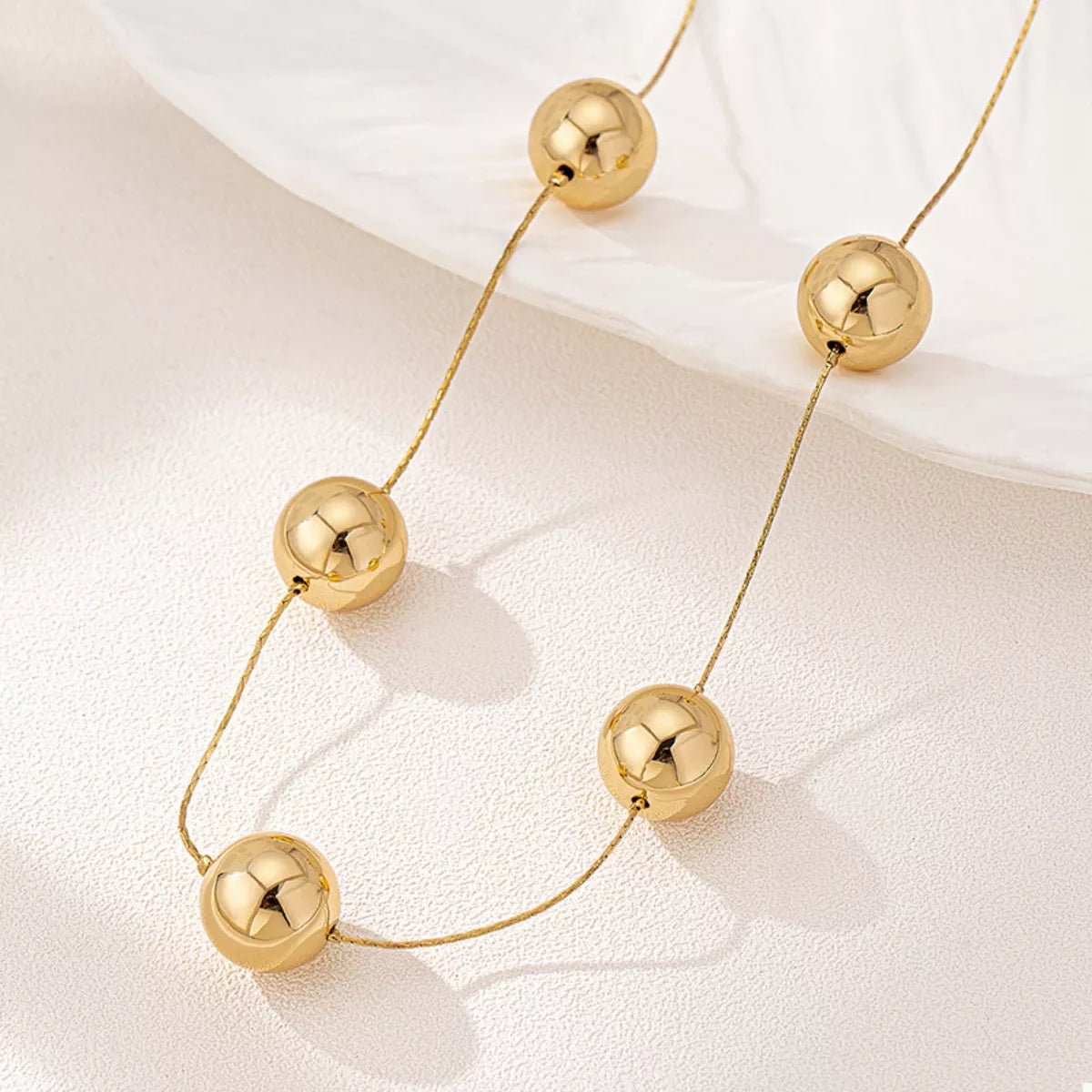 Golden Sphere Statement Necklace OutfitFlow