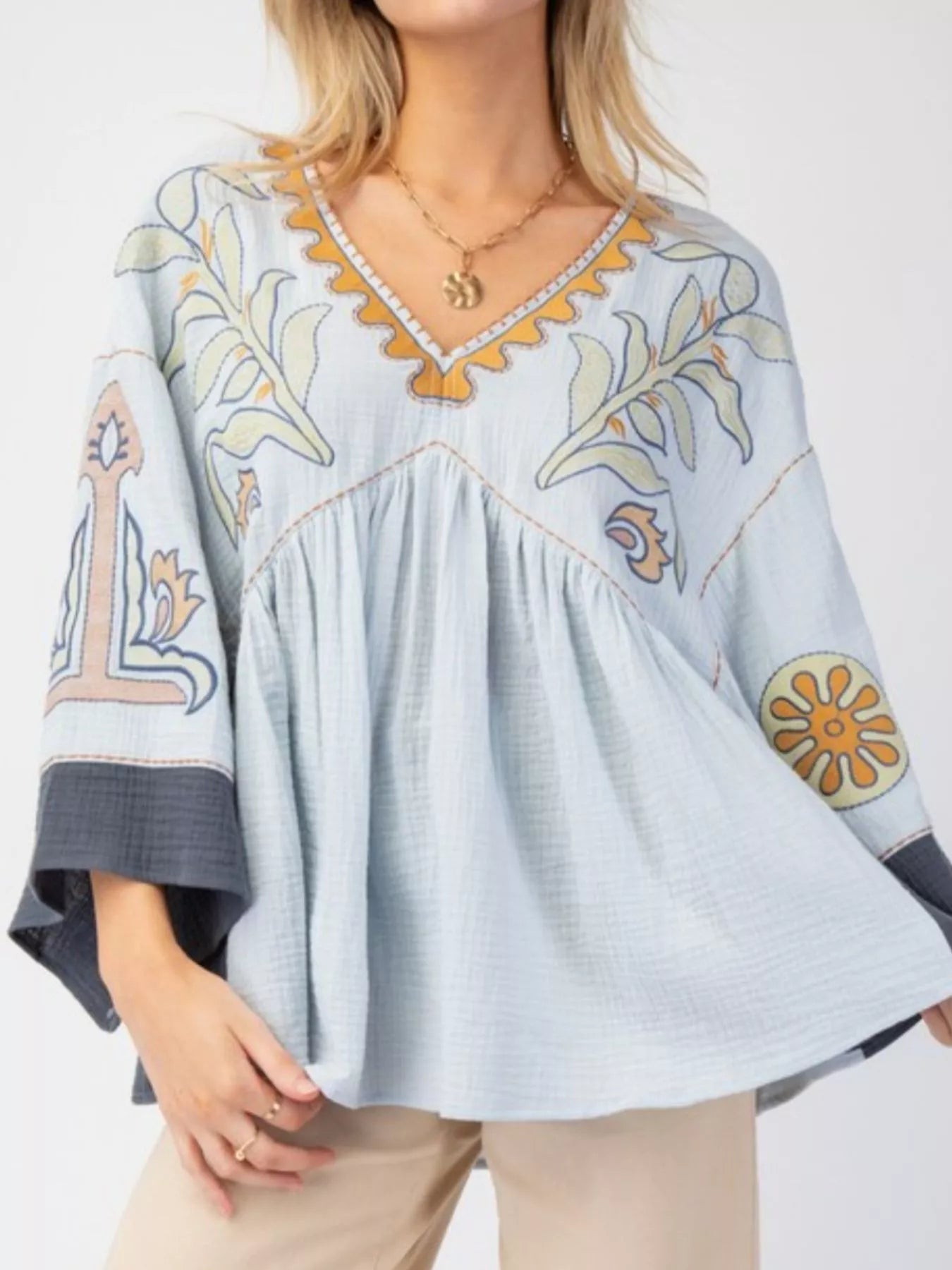 Printed V-Neck Top with Contrast Trim Details OutfitFlow