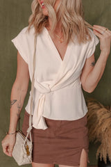 Surplice Knotted Ruched Cap Sleeve Blouse OutfitFlow