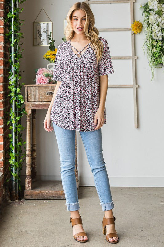 Heimish Full Size Short Sleeve Crisscross Animal Babydoll Top Plus Size OutfitFlow
