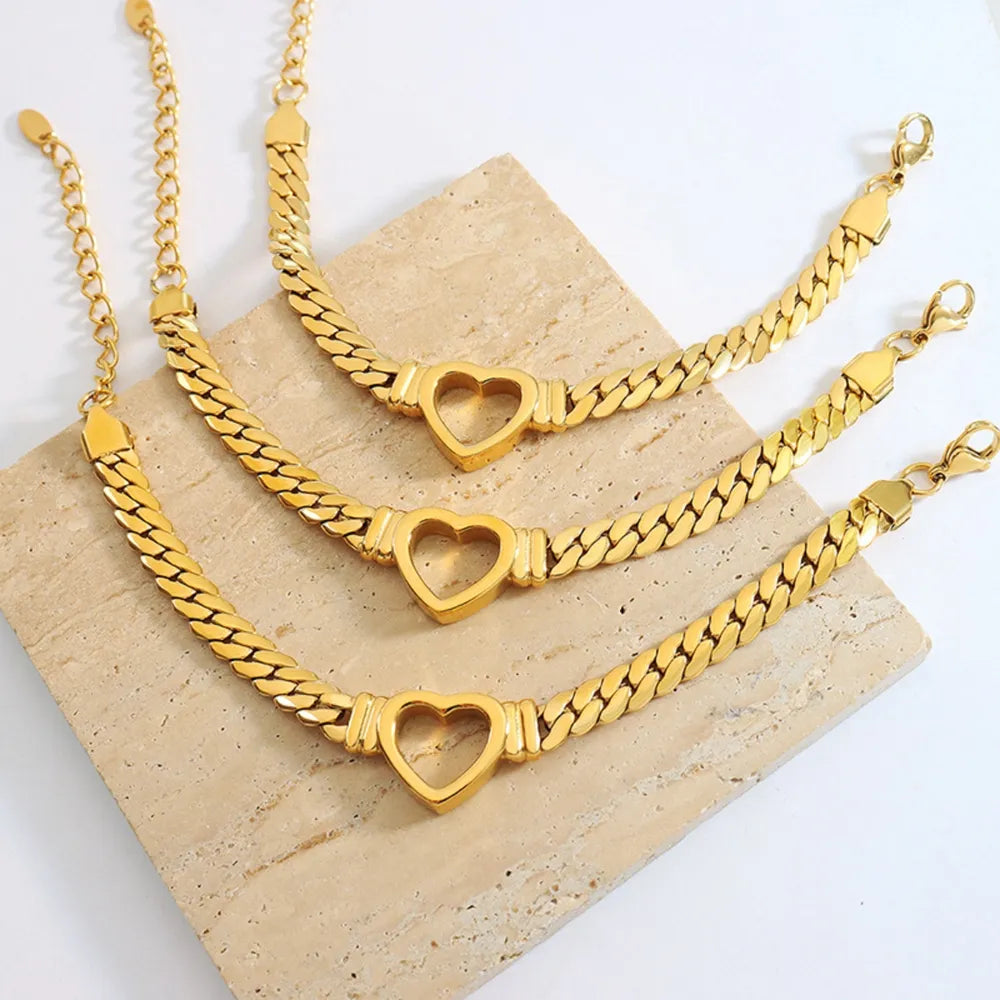Titanium Steel Cutout Heart Bracelet OutfitFlow