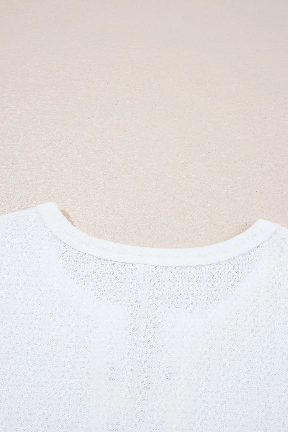 Textured Hollow Grommet Placket Split Neck Short Sleeve Top OutfitFlow