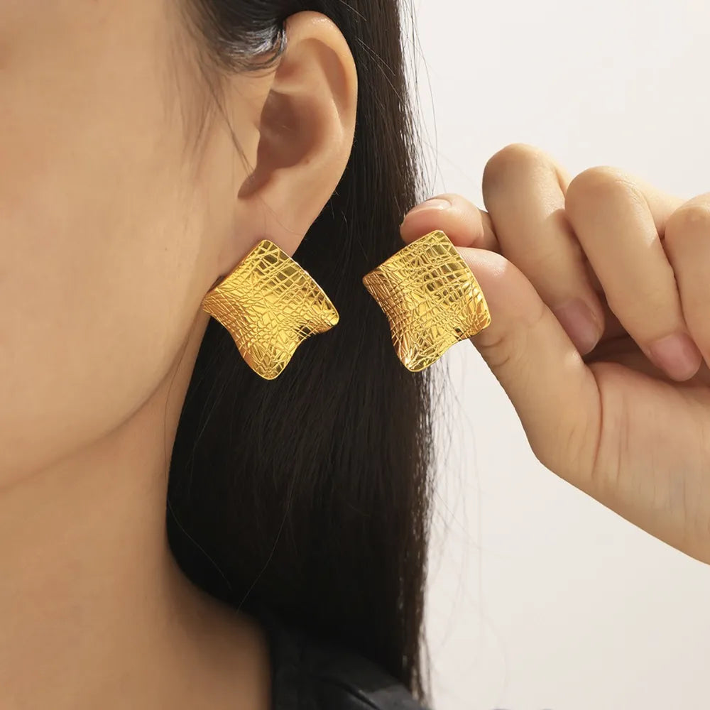 Textured Titanium Steel Stud Earrings Gold One Size OutfitFlow
