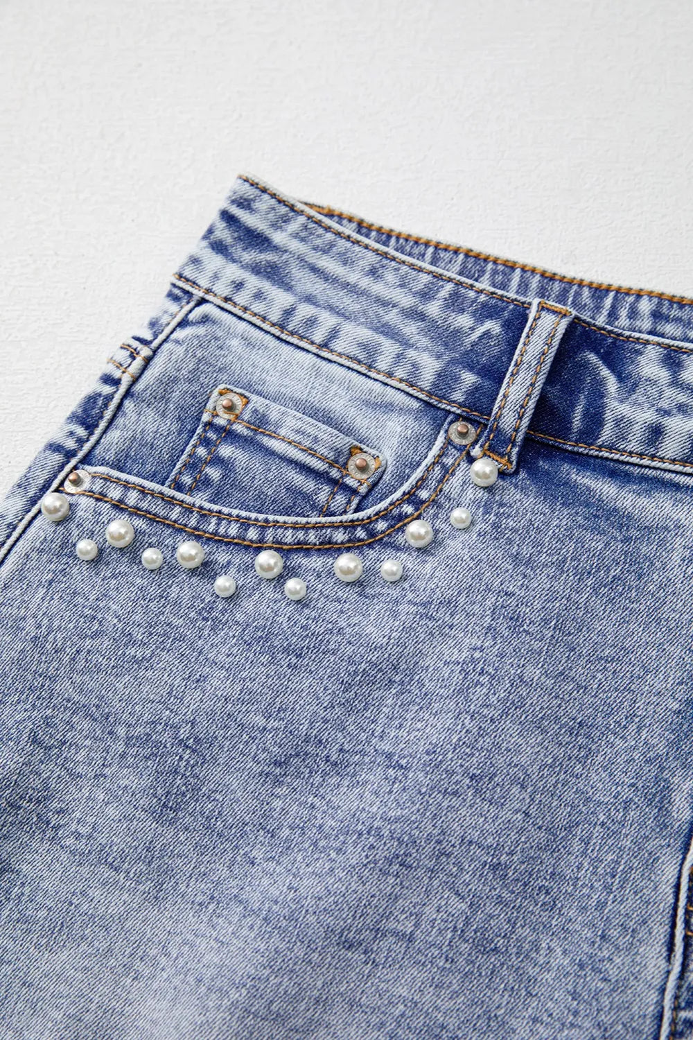 Pearl Studded Pockets Raw Hem Denim Shorts OutfitFlow