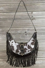 Fame Cow Print Faux Leather Fringe Hobo Bag OutfitFlow