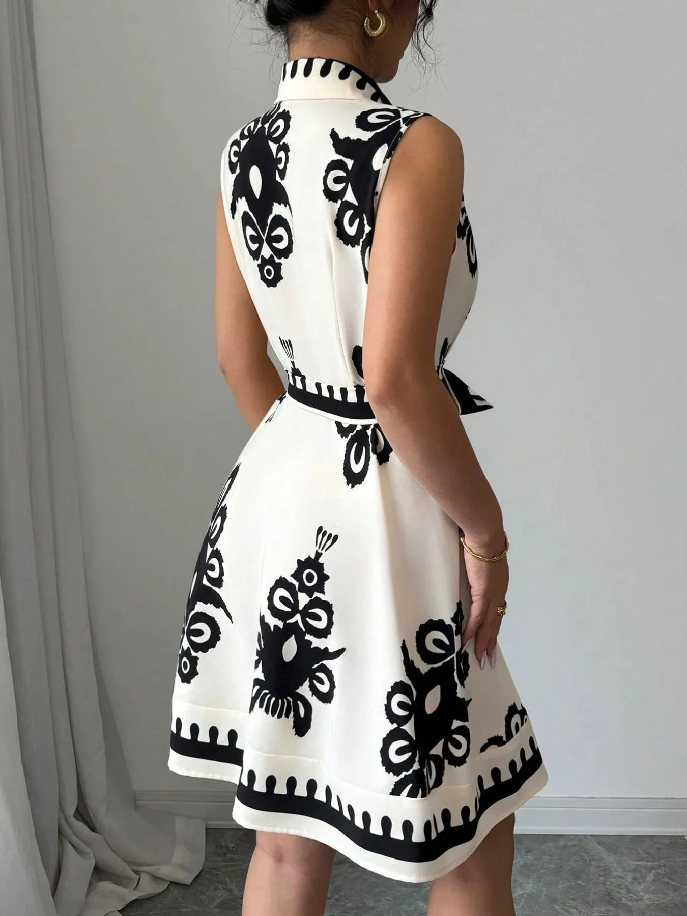 Printed Sleeveless Tie Waist Mini Dress OutfitFlow
