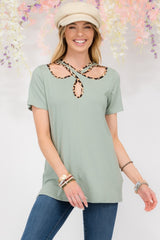 Celeste Full Size Crisscross Cutout Leopard Contrast Trim T-Shirt