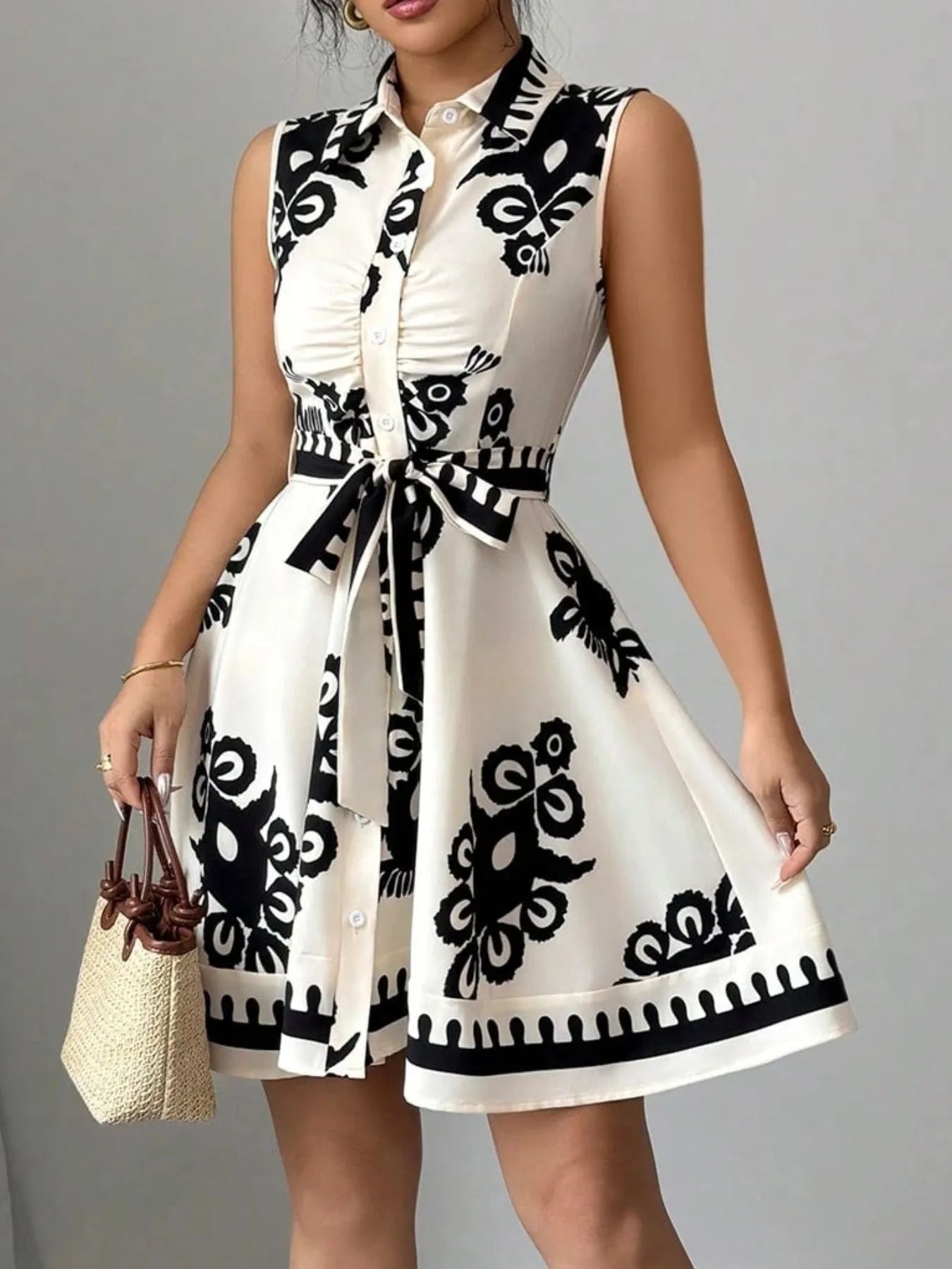 Printed Sleeveless Tie Waist Mini Dress OutfitFlow