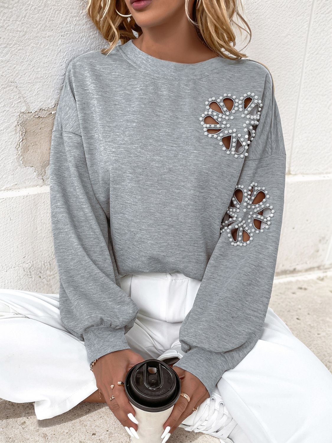 Outfit Flow - Perfee Cutout Pearl Round Neck Long Sleeve Sweatshirt