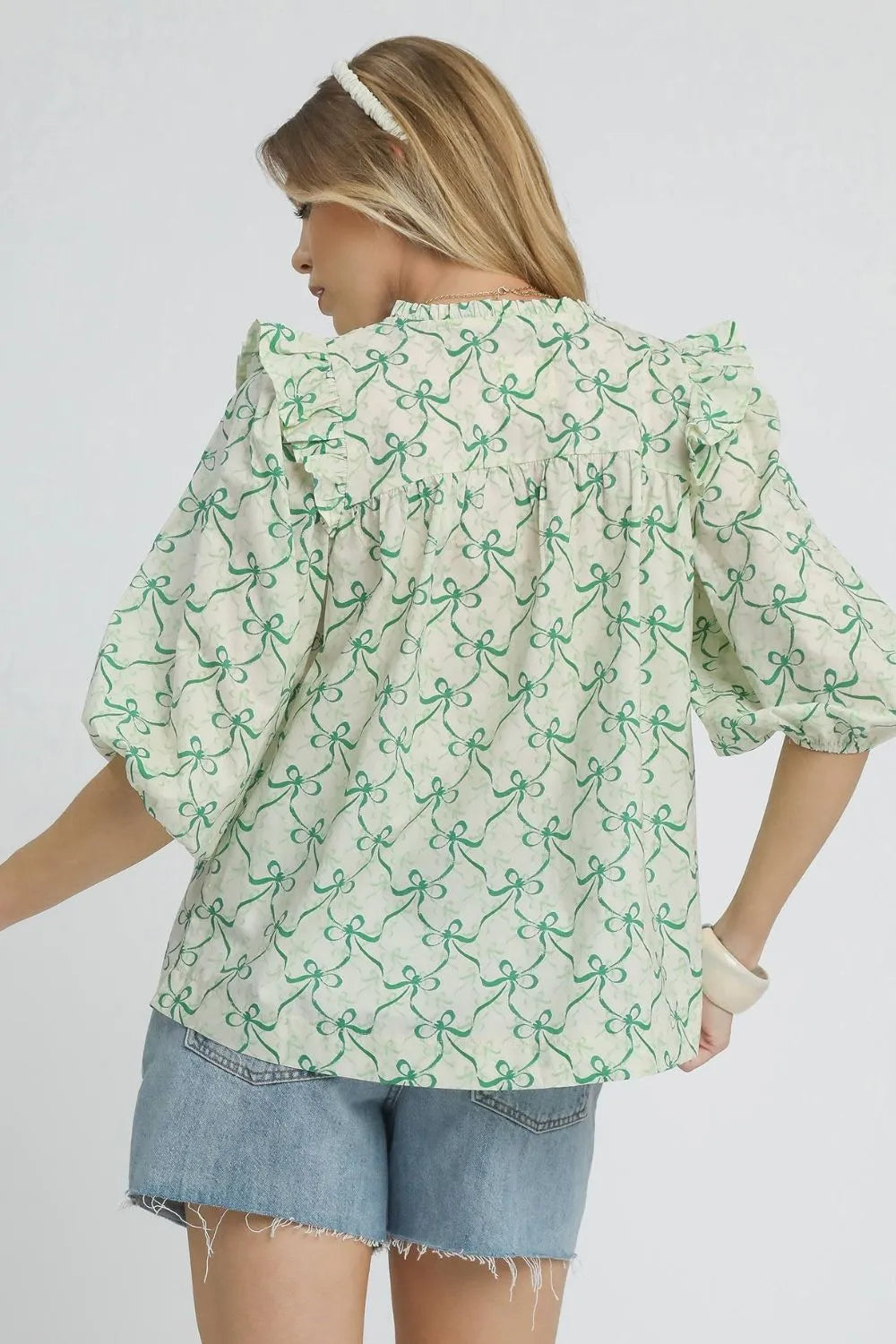 Umgee Ruffled Bow Print Notched Blouse OutfitFlow