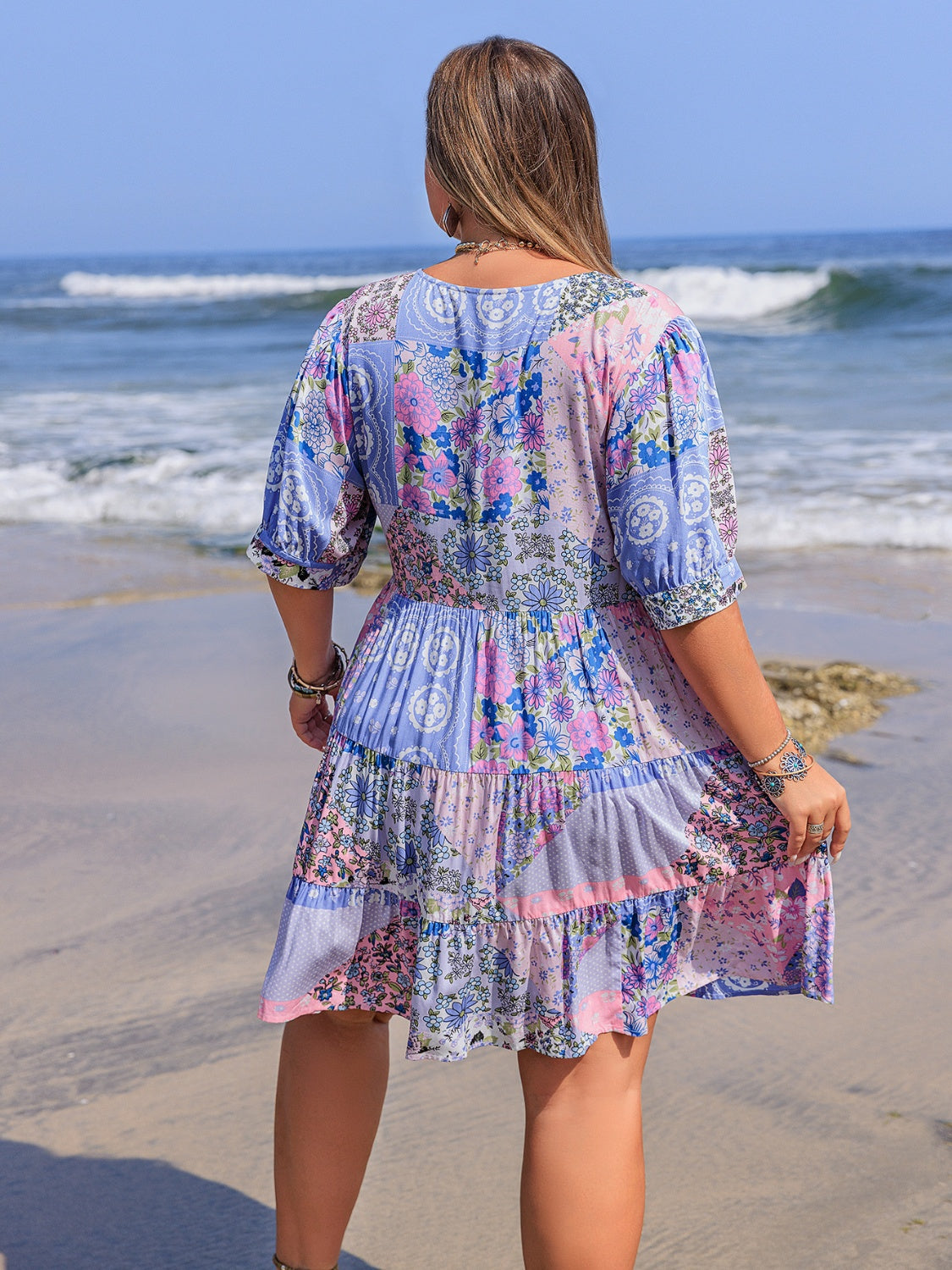 Plus Size Printed V-Neck Tiered Mini Dress OutfitFlow