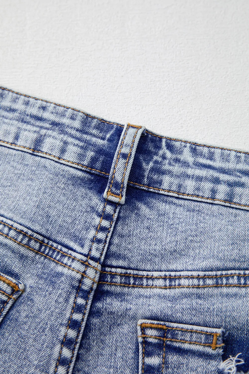 Pearl Studded Pockets Raw Hem Denim Shorts OutfitFlow