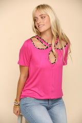 Celeste Full Size Crisscross Cutout Leopard Contrast Trim T-Shirt