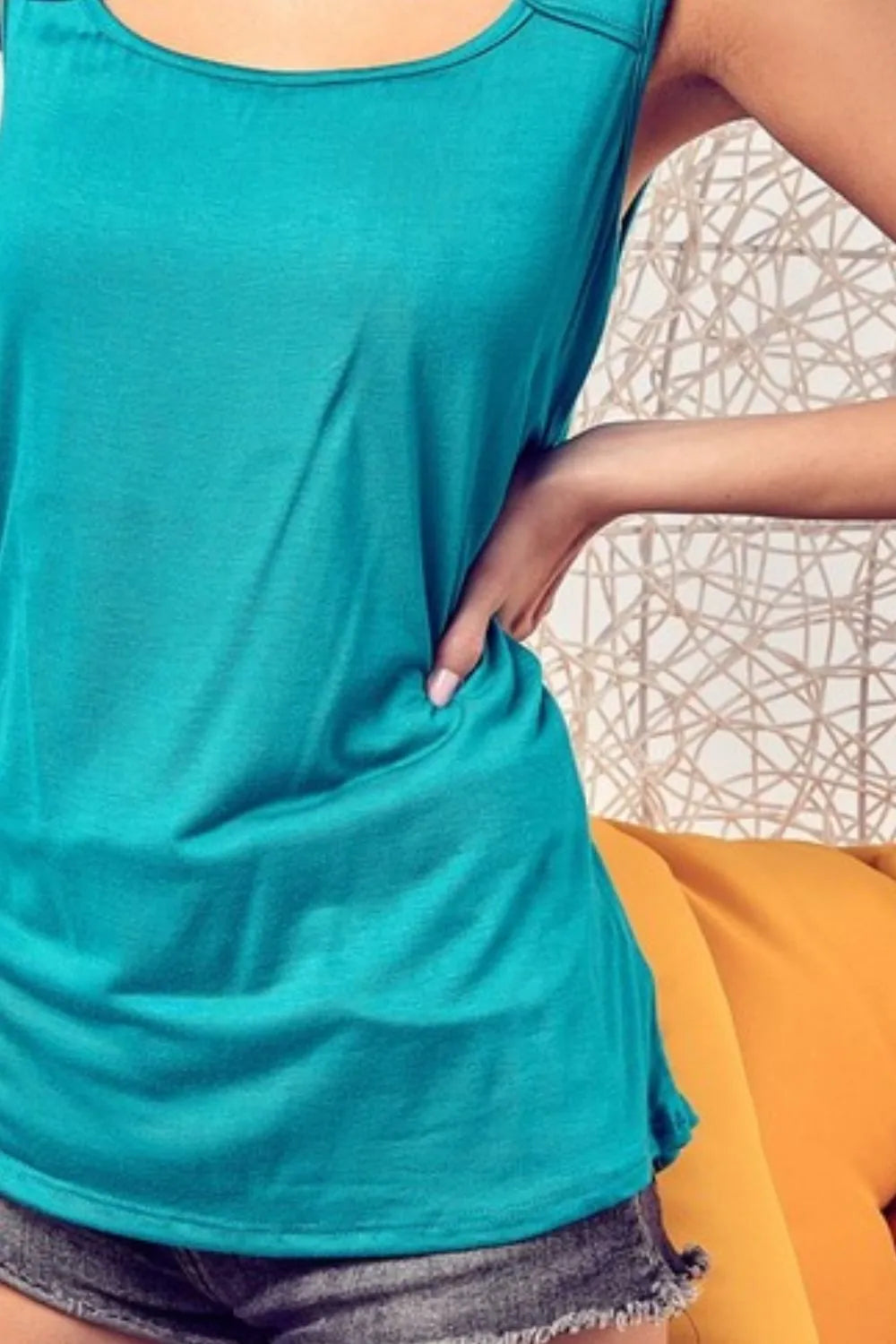 BiBi Rayon Span Knit With Cut Out Front Sleeveless Top OutfitFlow
