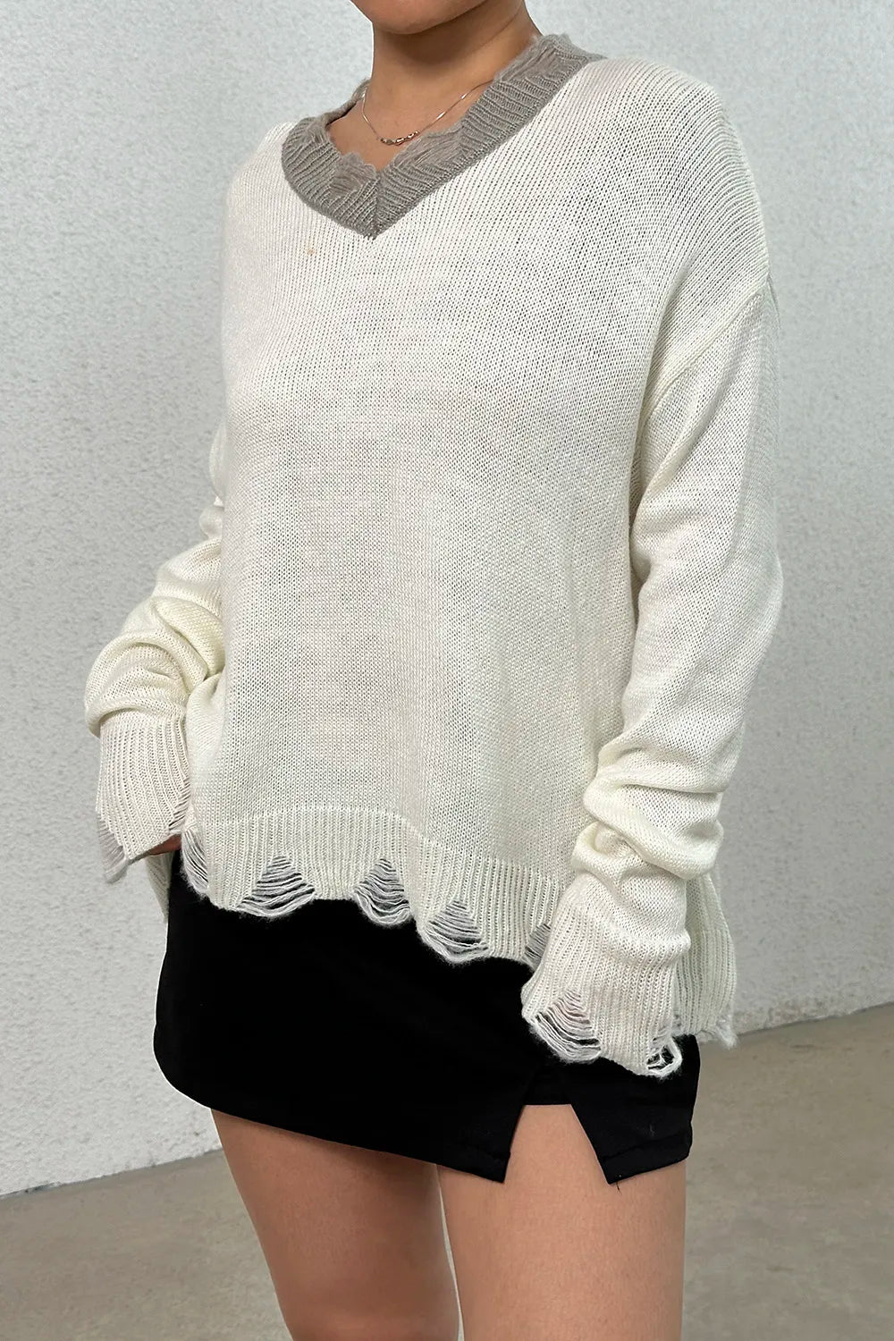 Distressed V-Neck Dropped Shoulder Sweater OutfitFlow