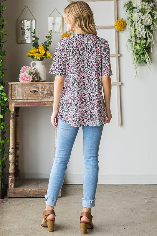 Heimish Full Size Short Sleeve Crisscross Animal Babydoll Top Plus Size OutfitFlow
