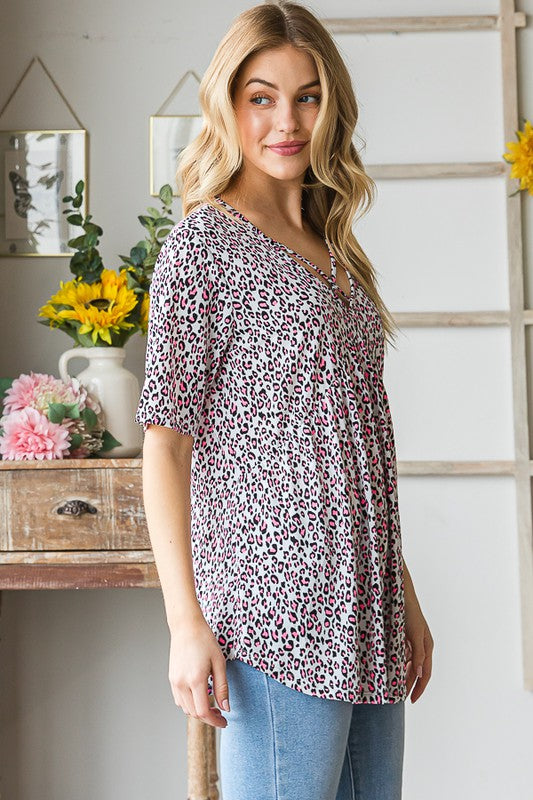 Heimish Full Size Short Sleeve Crisscross Animal Babydoll Top Plus Size OutfitFlow
