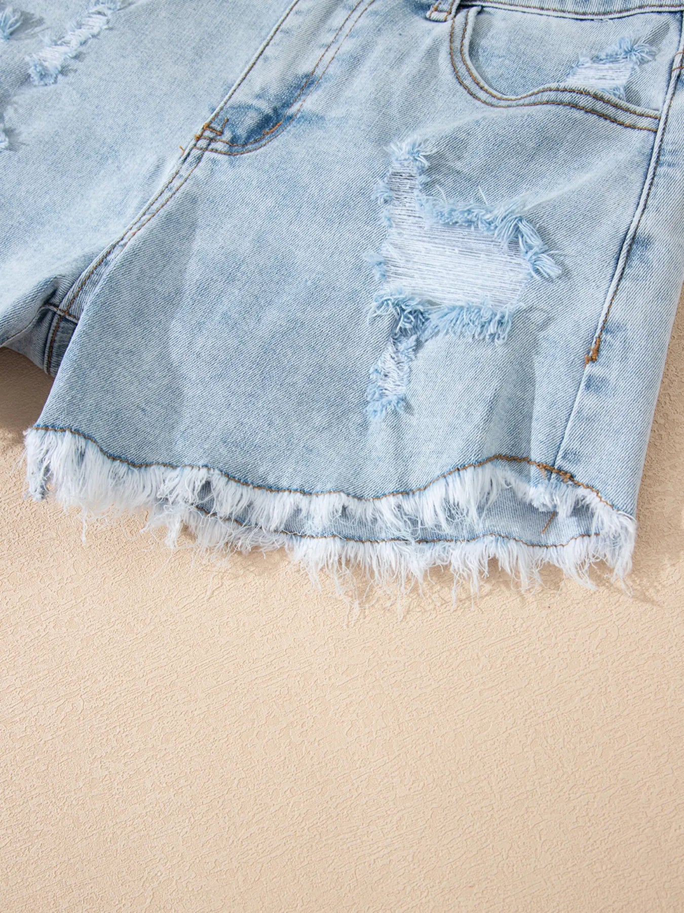 High Rise Distressed Raw Hem Denim Shorts OutfitFlow