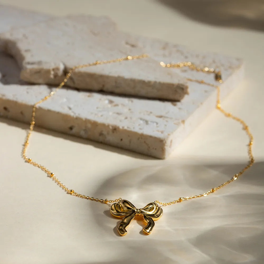 Stainless Steel Bow Pendant Necklace OutfitFlow