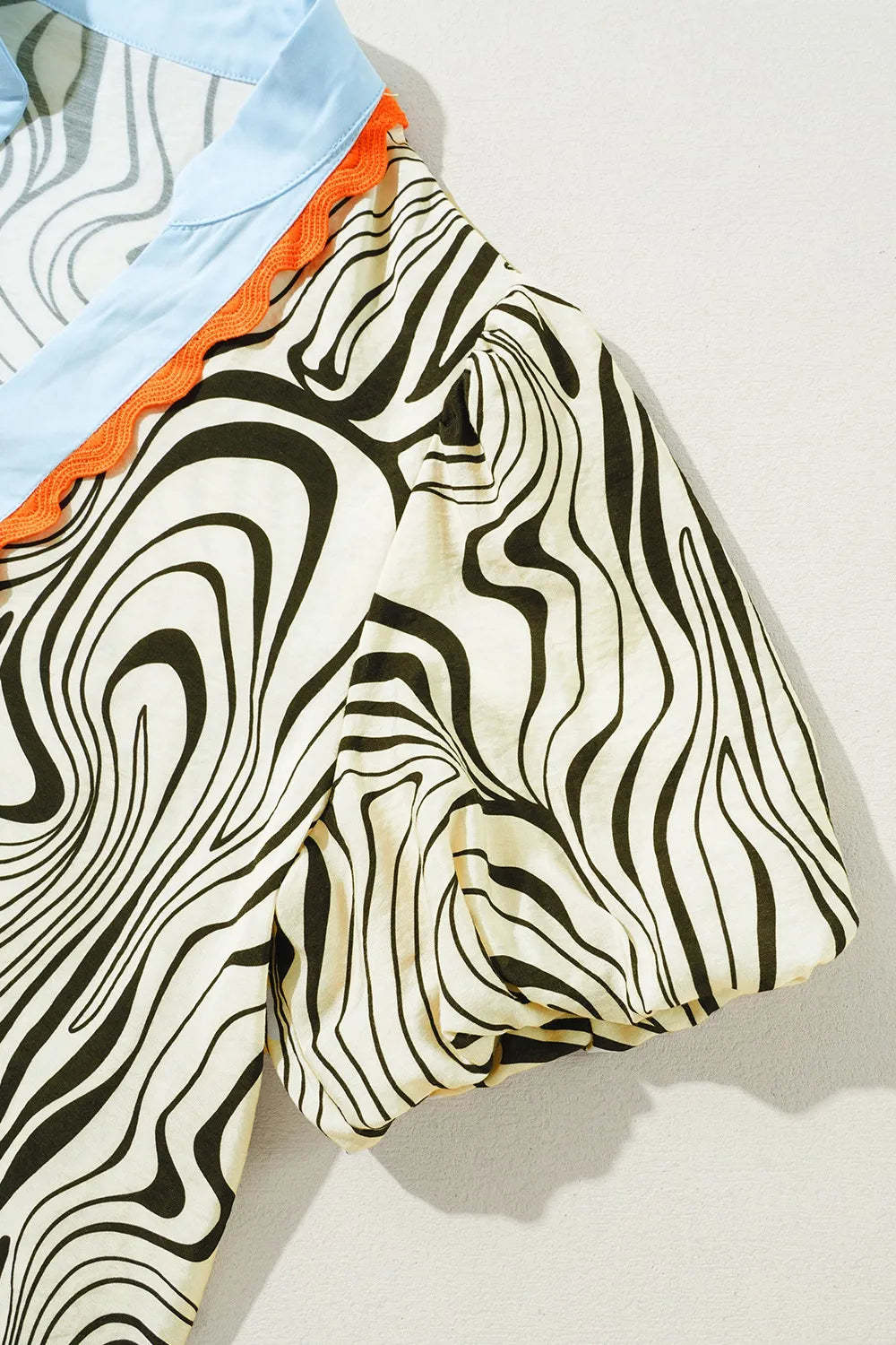 Zebra Stripe Print Contrast V-Neck Ricrac Detail Short Sleeve Blouse Top OutfitFlow