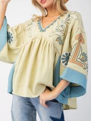 Printed V-Neck Top with Contrast Trim Details Green And Blue OutfitFlow