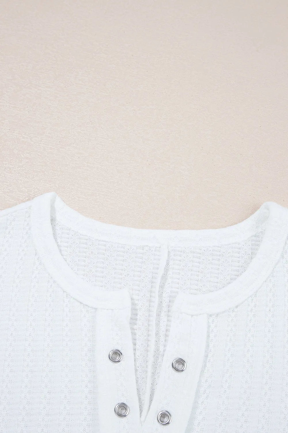 Textured Hollow Grommet Placket Split Neck Short Sleeve Top OutfitFlow