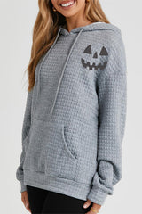 Pumpkin Face Graphic Drawstring Hoodie with Pocket OutfitFlow