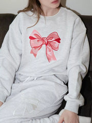 Bow Graphic Round Neck Long Sleeve Sweatshirt OutfitFlow
