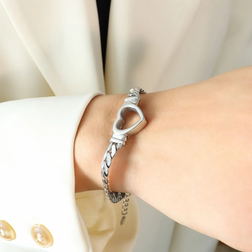 Titanium Steel Cutout Heart Bracelet Silver One Size OutfitFlow
