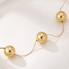 Golden Sphere Statement Necklace OutfitFlow