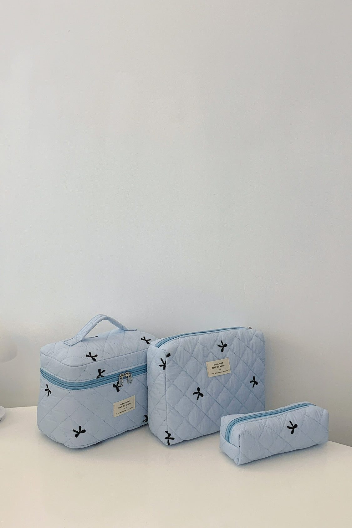 Outfit Flow - 3 Piece Bow Quilted Cloth Storage Bag Set