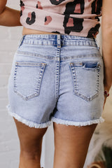 Pearl Studded Pockets Raw Hem Denim Shorts OutfitFlow