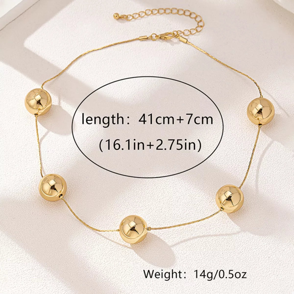 Golden Sphere Statement Necklace OutfitFlow