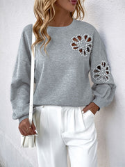 Outfit Flow - Perfee Cutout Pearl Round Neck Long Sleeve Sweatshirt