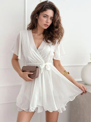 Surplice Flutter Sleeve Mini Dress OutfitFlow