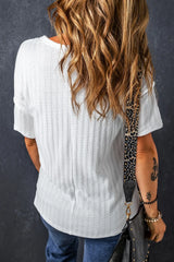 Textured Hollow Grommet Placket Split Neck Short Sleeve Top OutfitFlow